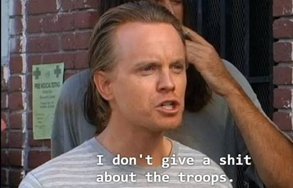 Image of an angry-looking man speaking, subtitled "I don't give a shit about the troops."
